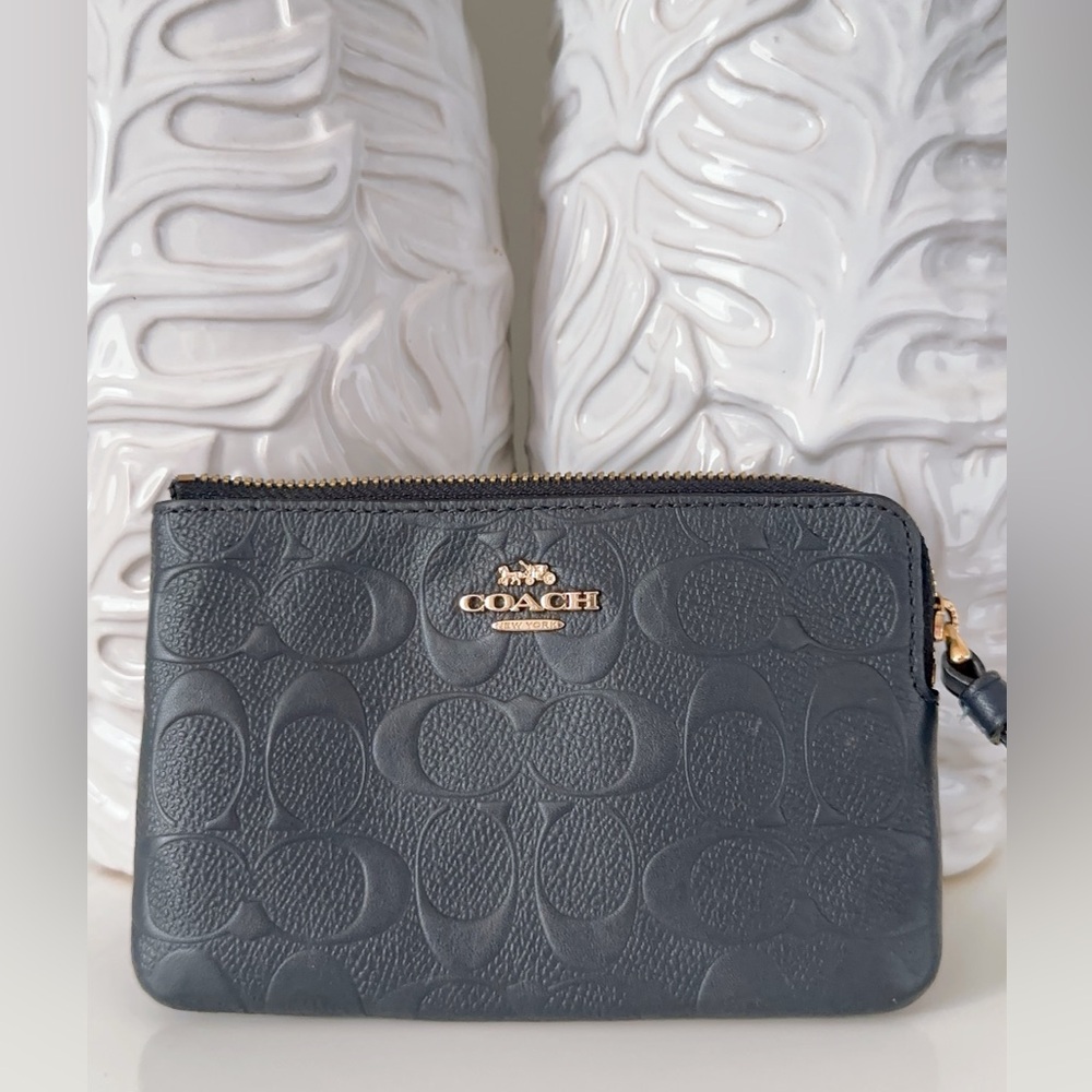 Coach Black Embossed Signature Leather Pouch with Gold Logo